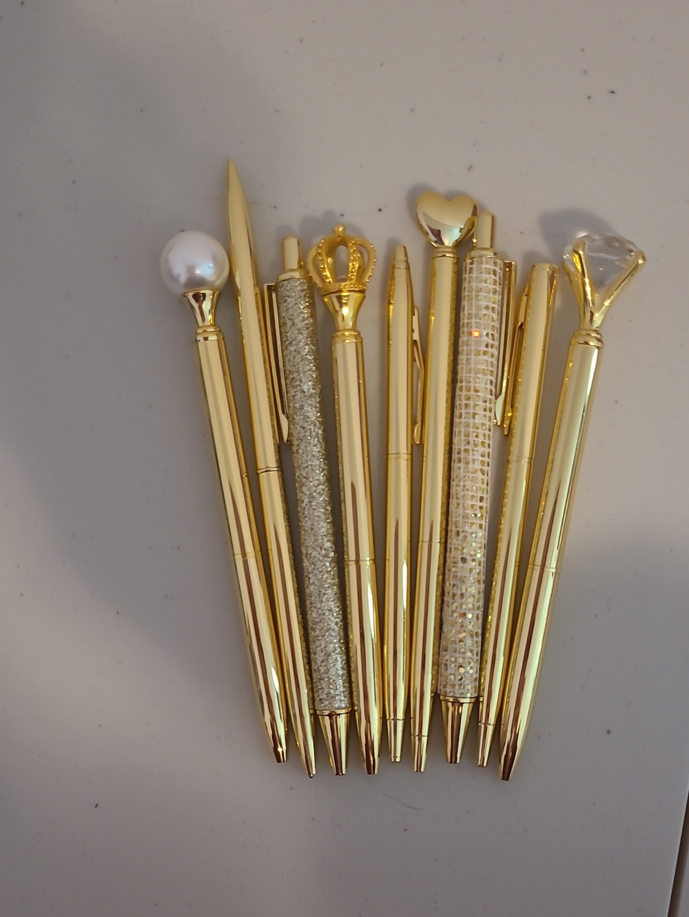Set of Decorative Gold Metal Ballpoint Pens with Embellished Tops